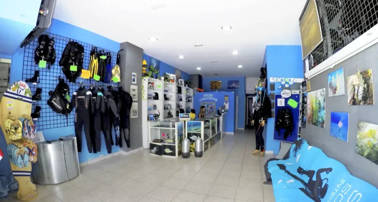 Scuba diving equipment organized inside a diving center in La Palma