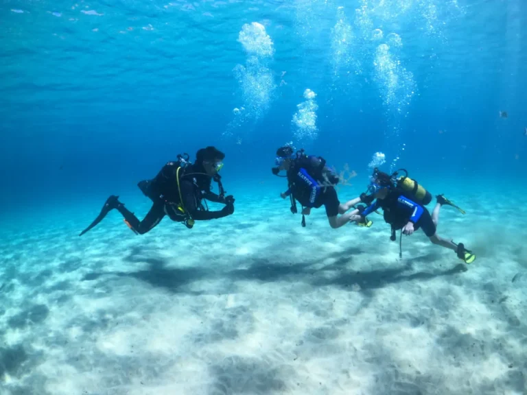 Instructor with two student divers during an Open Water Diver course in Lanzarote